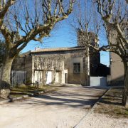© Maison vue de la place - <em>Perrenot</em>