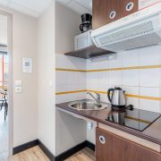 © Kitchenette en studio - <em>Appart city</em>